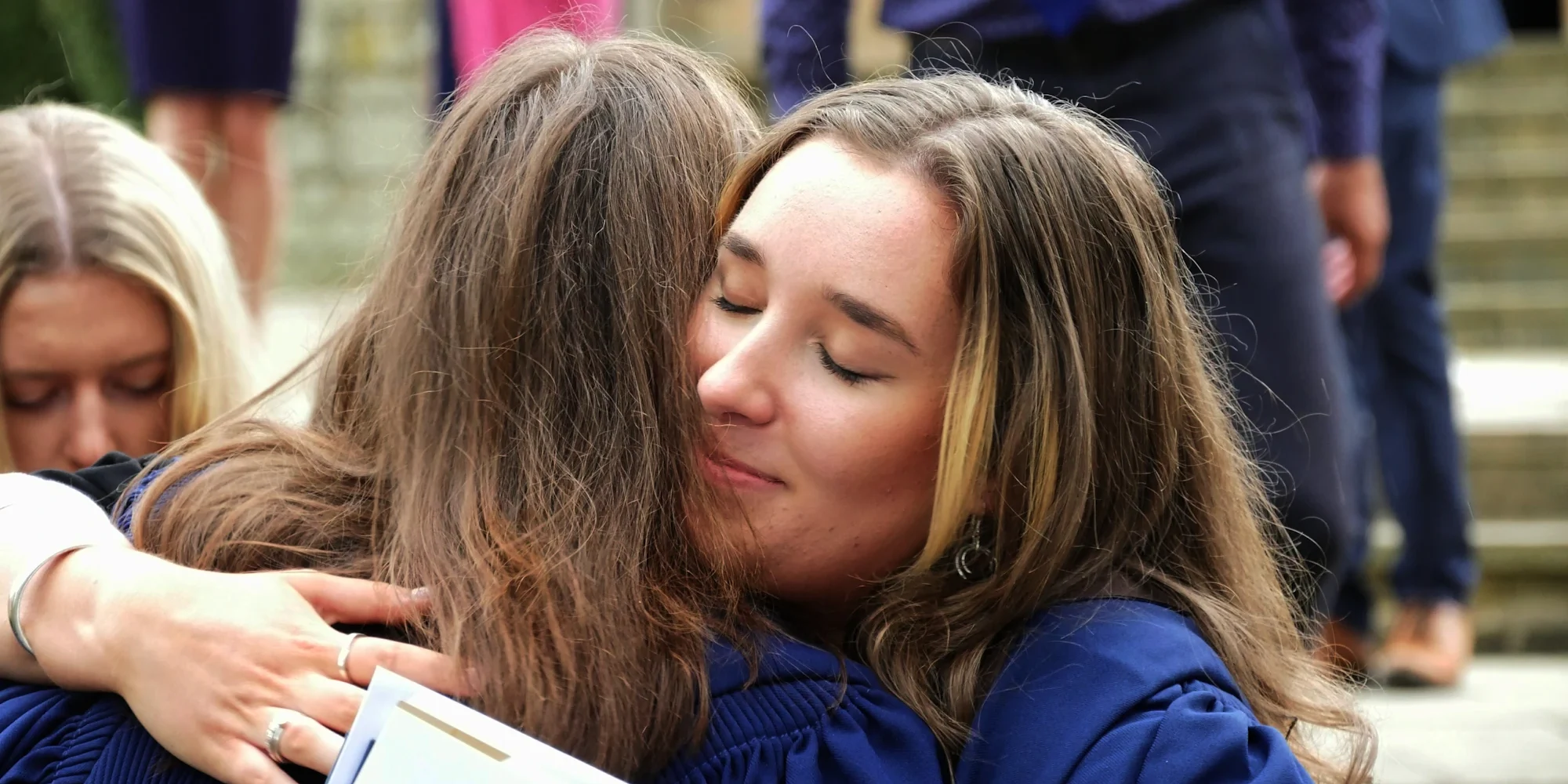A Barnard Castle School pupil hugging someone dear to them.
