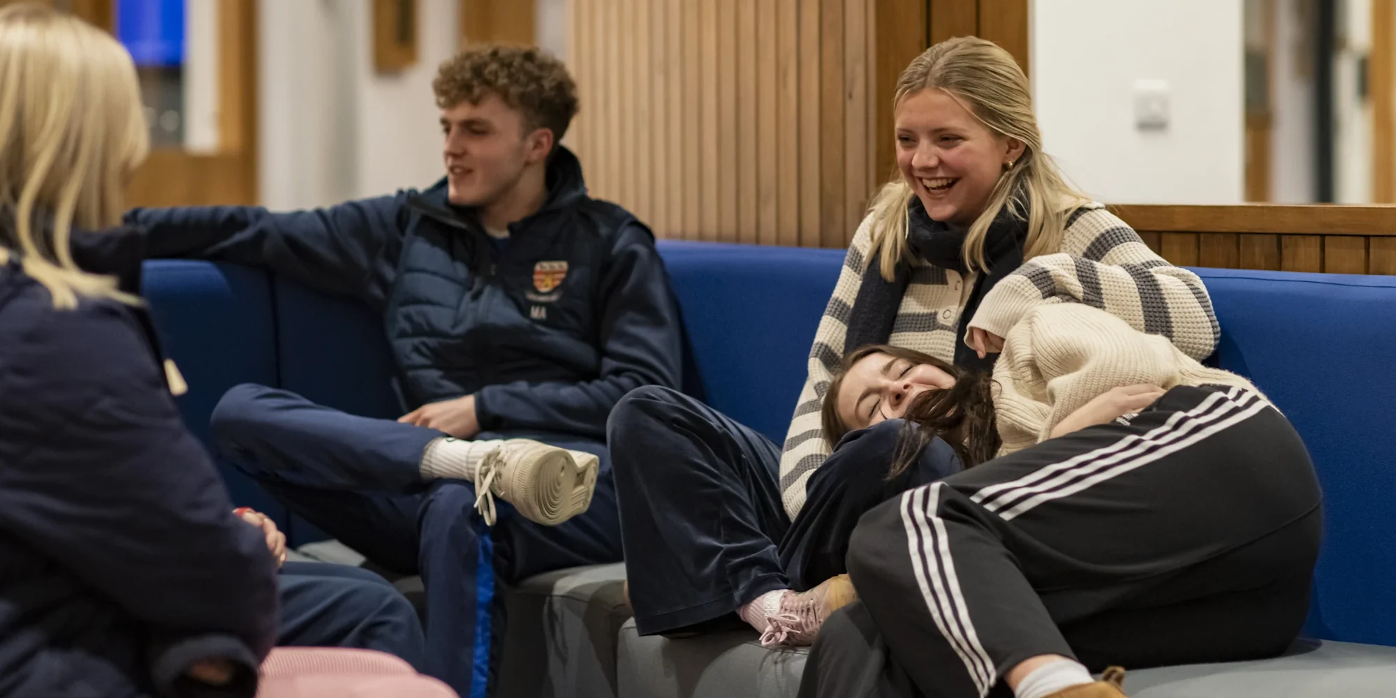 Barnard Castle School boarding pupils sitting together.