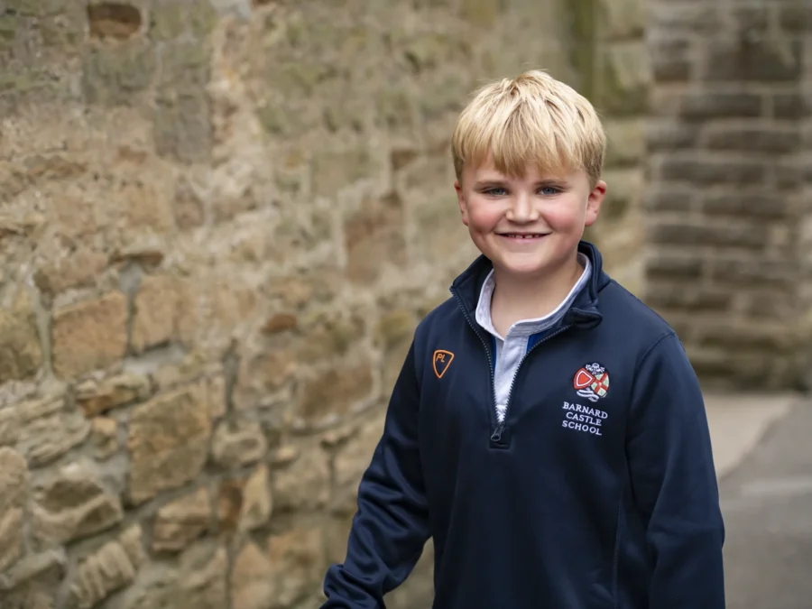 Barnard Castle School prep pupil smiling.