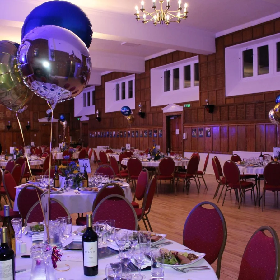 Barnard Castle School event prepared in a hall with tables.