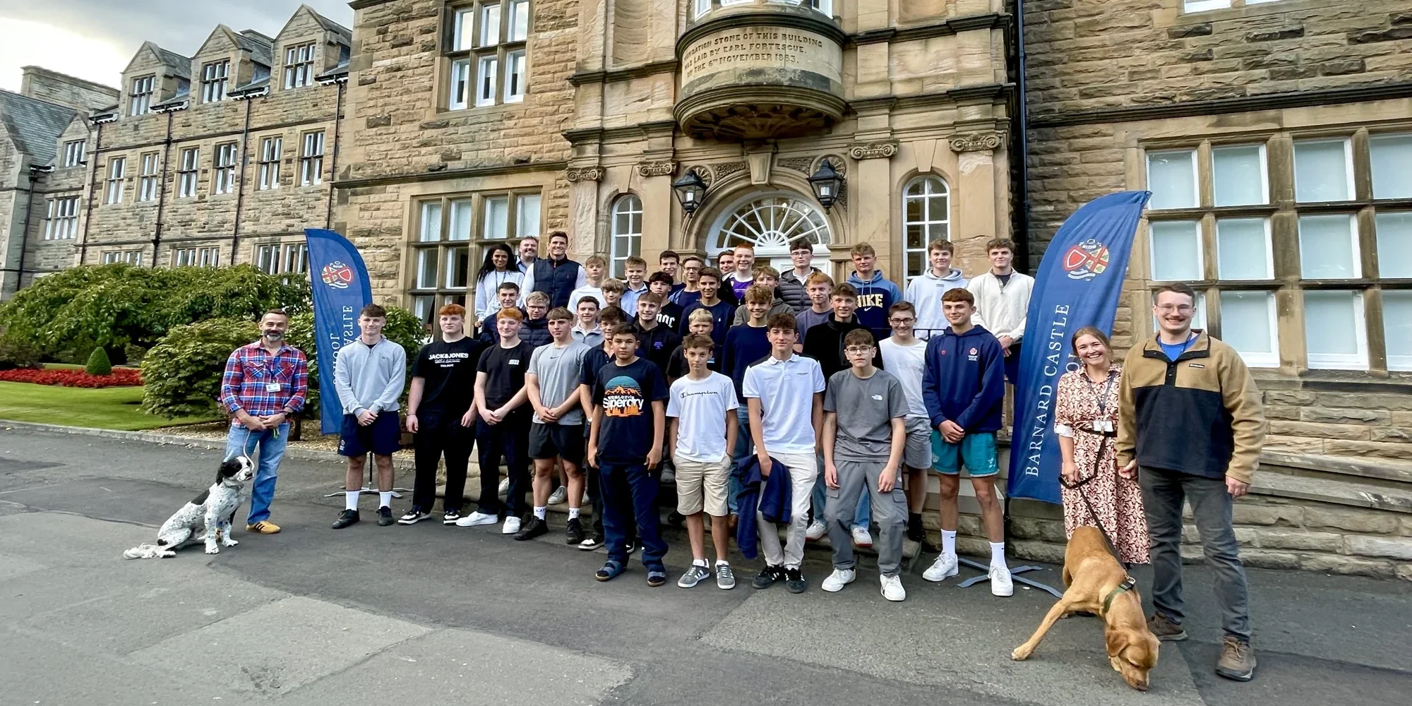 Big group of international students stood outside of Barnard Castle School.