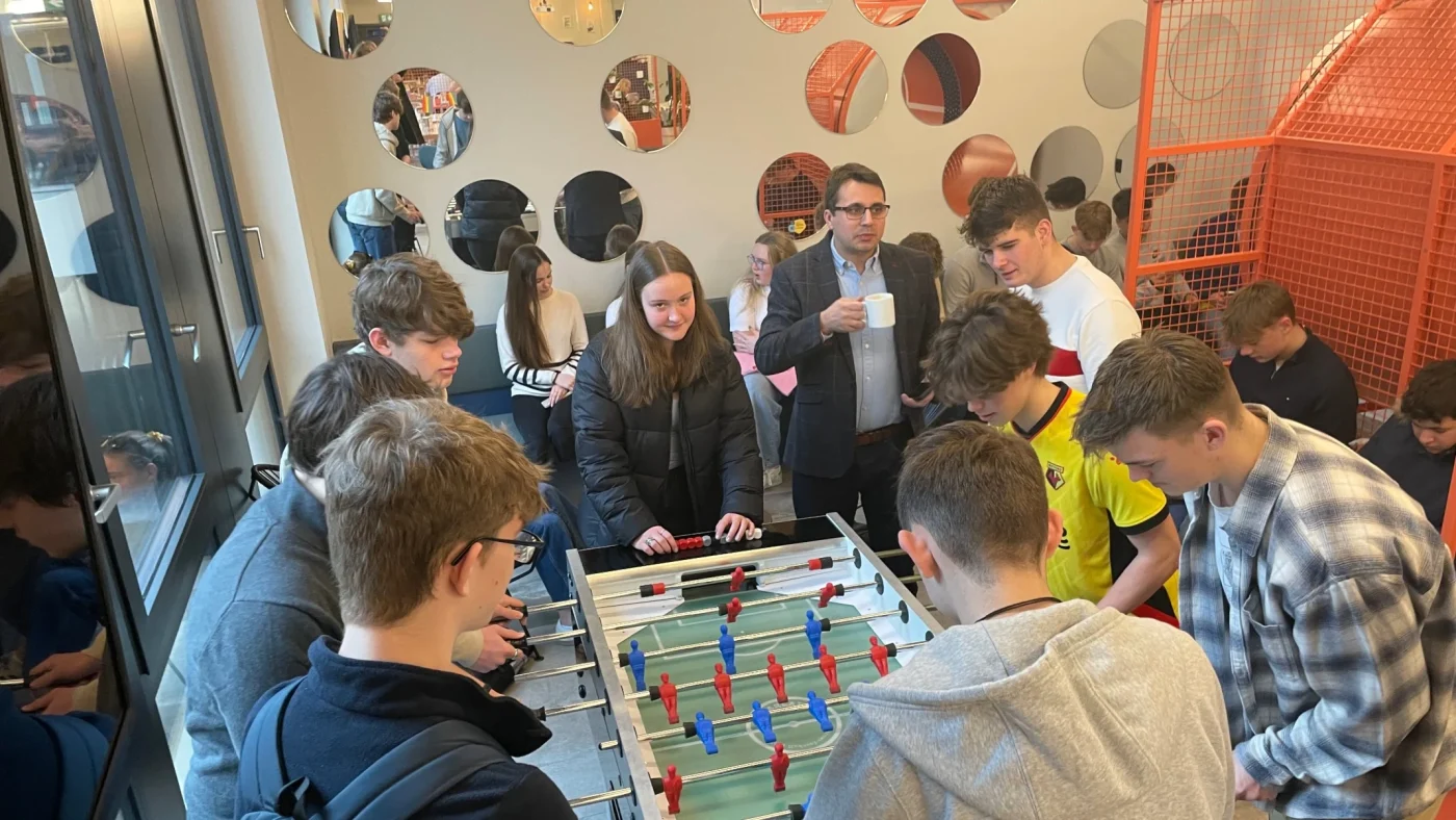 Barney students playing bar football.